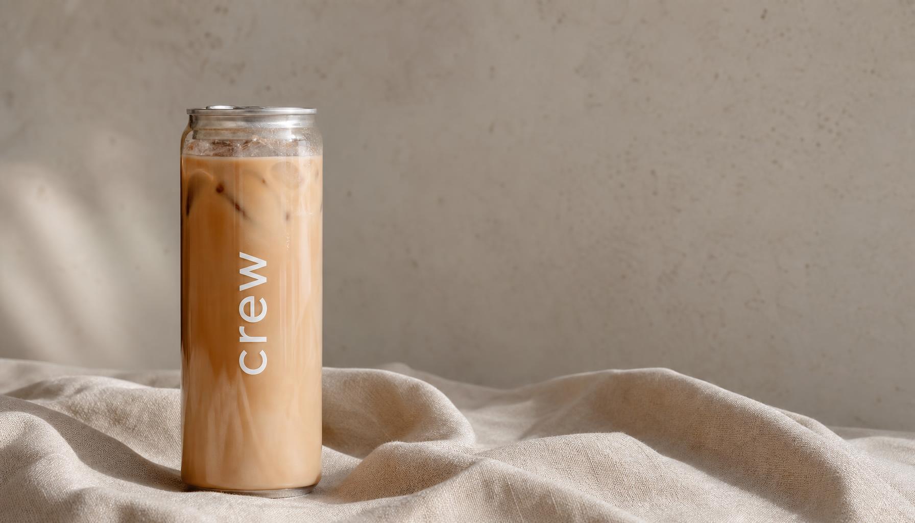 crew cold brew still life on warm sand-toned fabric